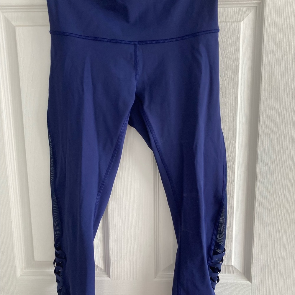 Lululemon Leggings with sheer detail on sides.